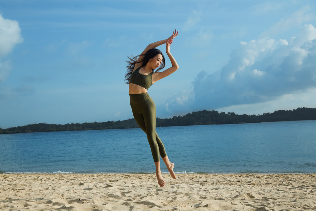 Girl dancing at the beach