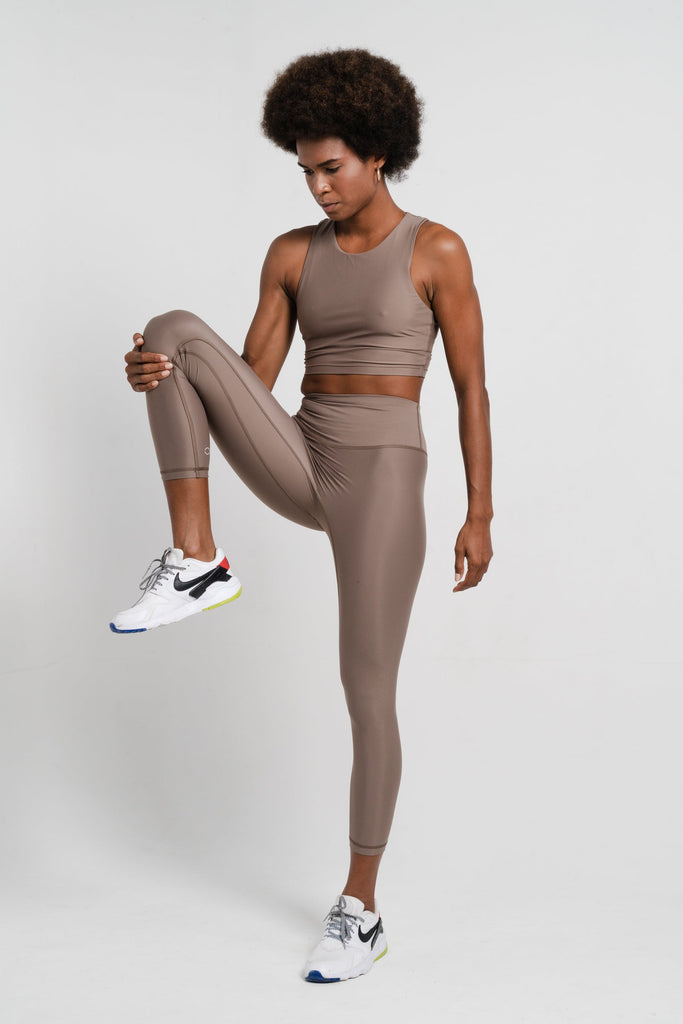 girl stretching wearing sustainable activewear